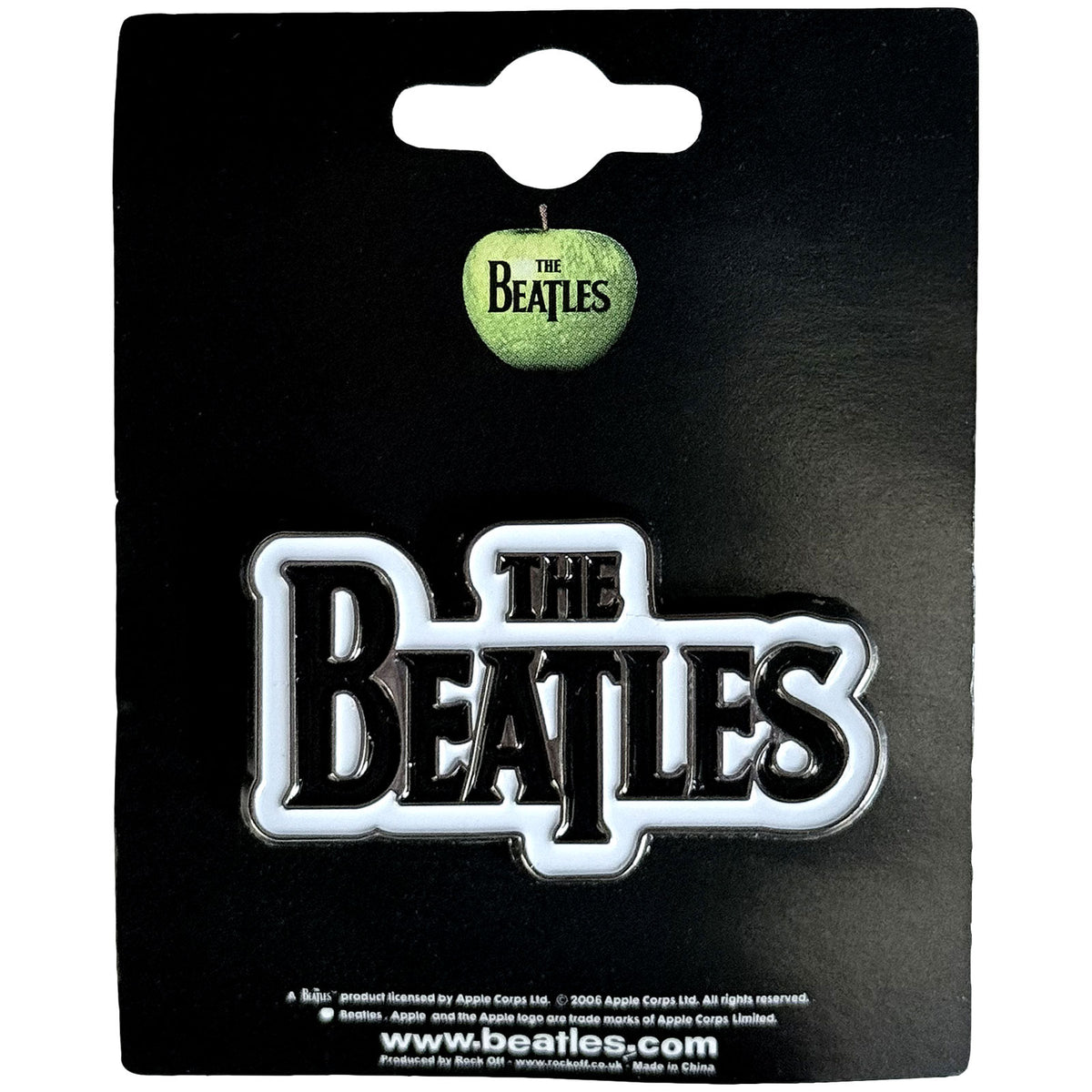 Een foto van een The Beatles Speld Badge