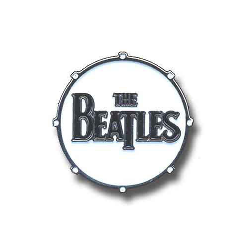 Een foto van een The Beatles Speld Badge