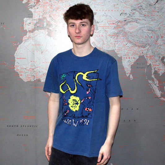 Een foto van een The Cure T-Shirt