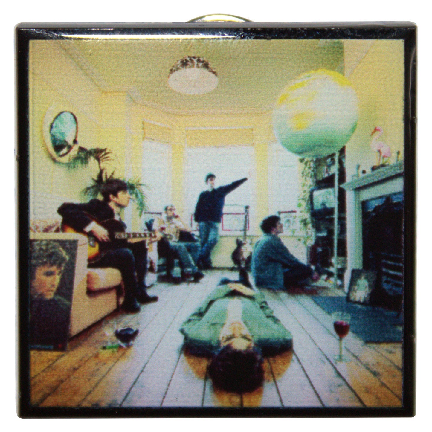 Een foto van een Oasis Speld Badge
