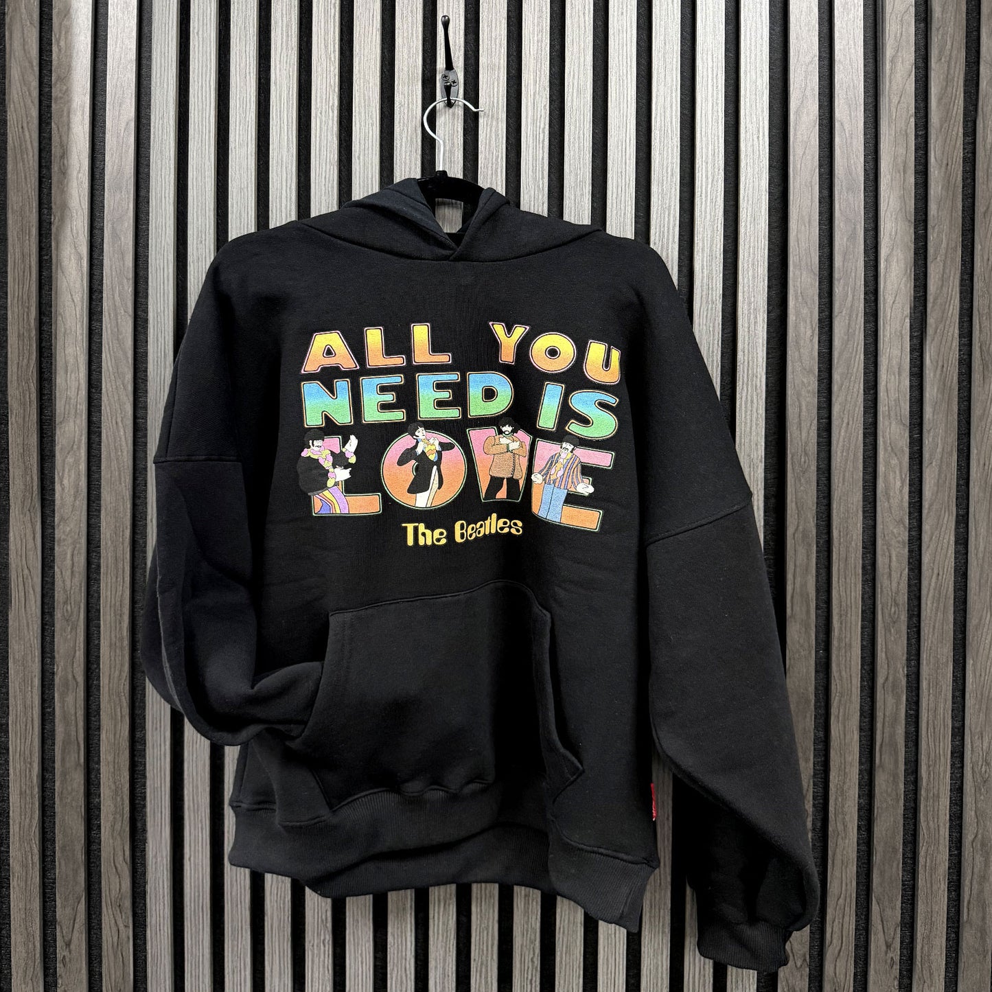 Een foto van een The Beatles Hoodie
