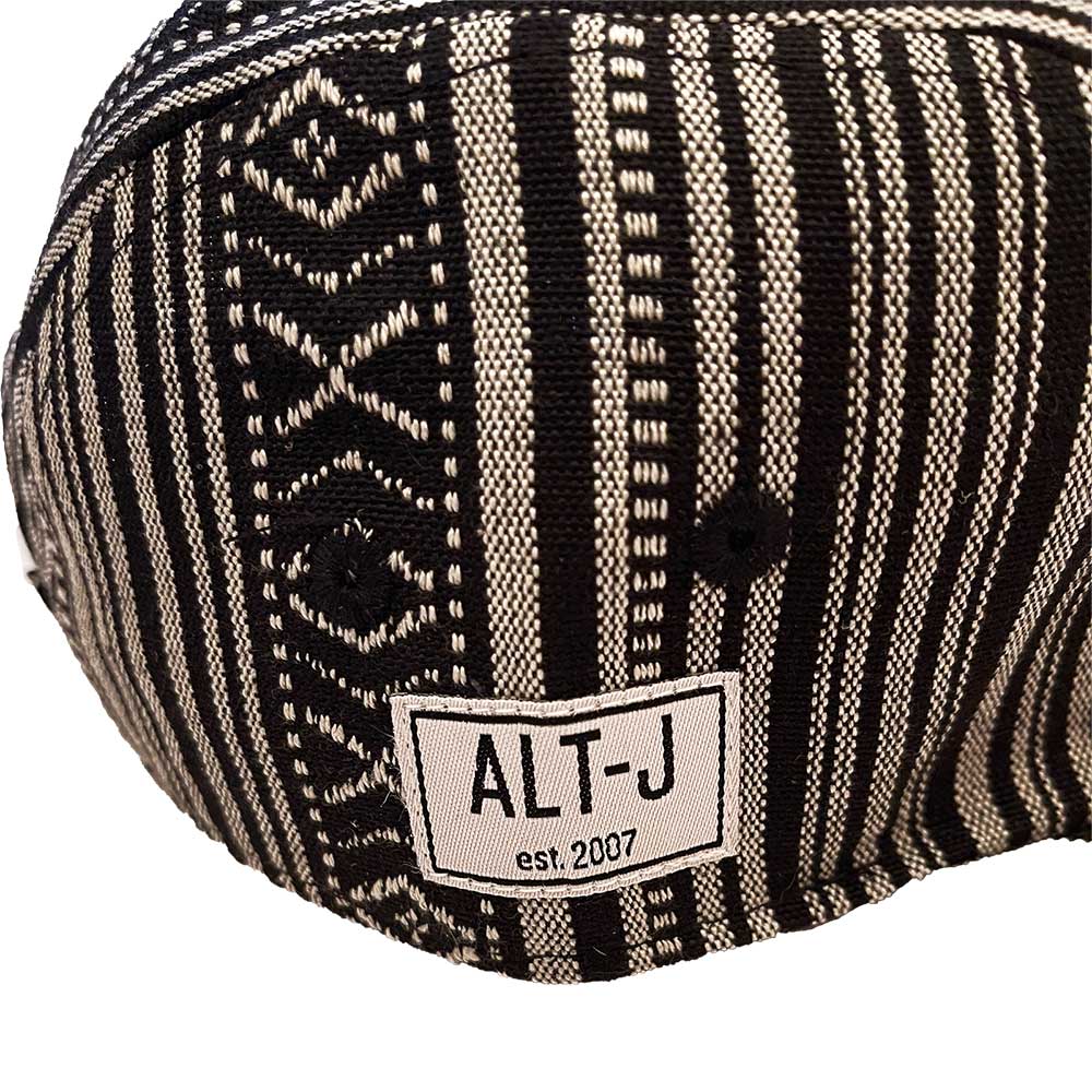 Een foto van een Alt-J Camper Cap