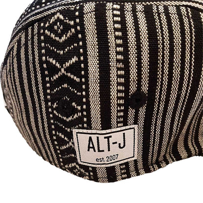 Een foto van een Alt-J Camper Cap