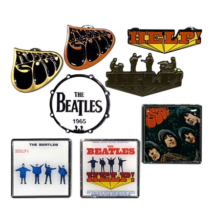 Een foto van een The Beatles Speld Badge