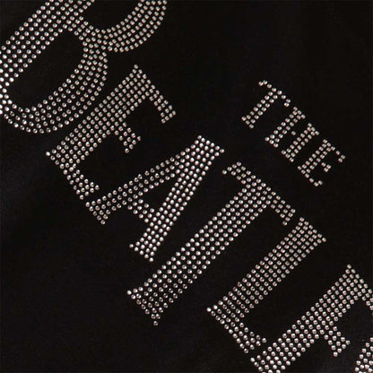 Een foto van een The Beatles T-Shirt