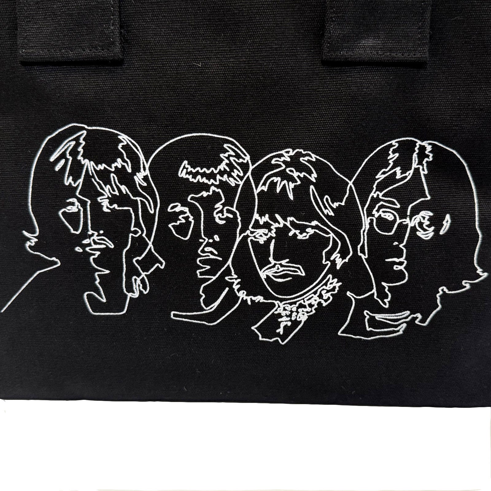 Een foto van een The Beatles Tas