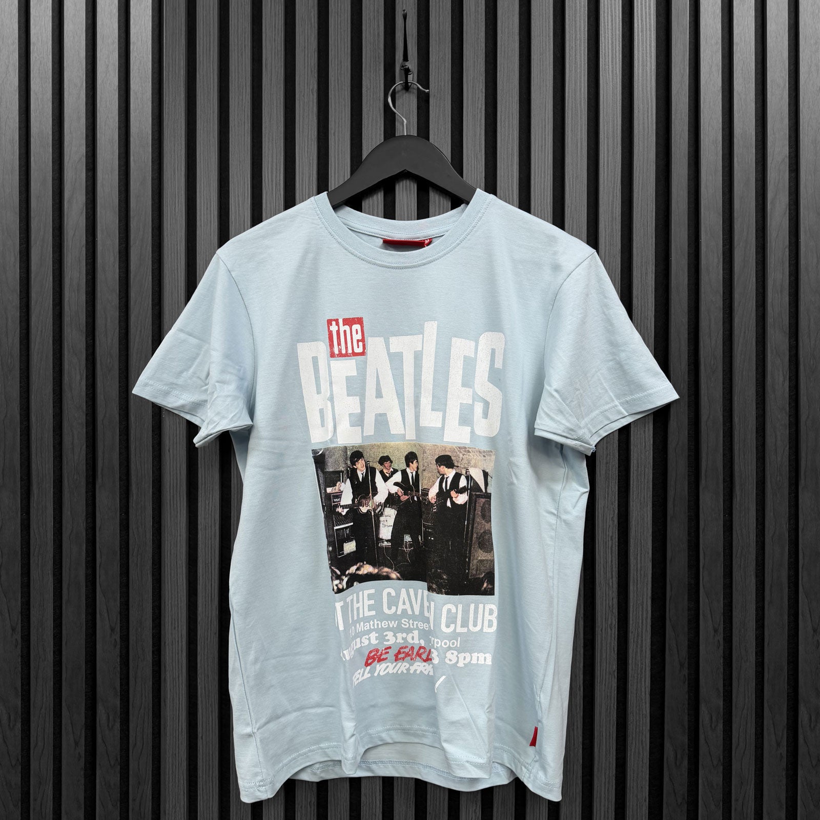 Een foto van een The Beatles T-Shirt