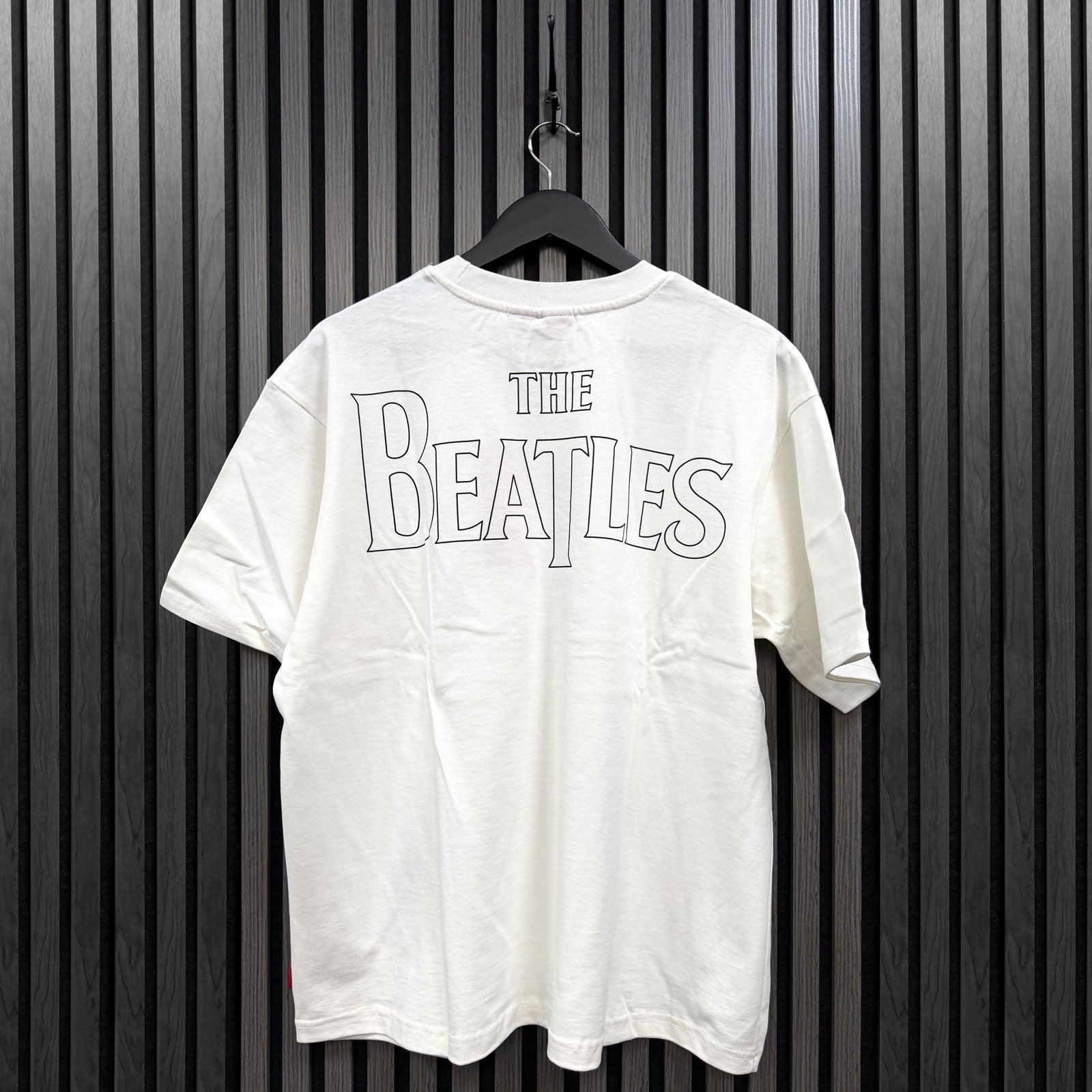 Een foto van een The Beatles T-Shirt