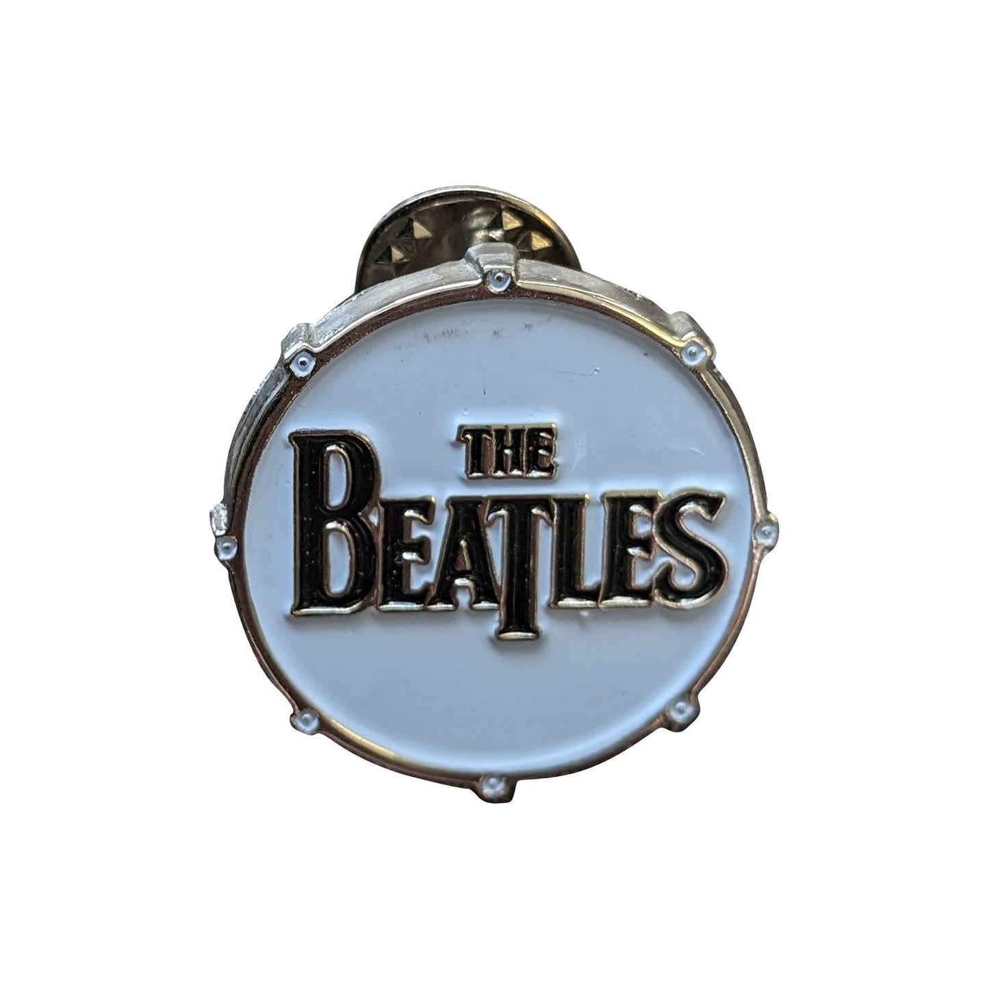 Een foto van een The Beatles Speld Badge