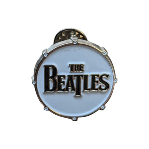 Een foto van een The Beatles Speld Badge