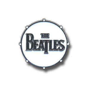 Een foto van een The Beatles Speld Badge