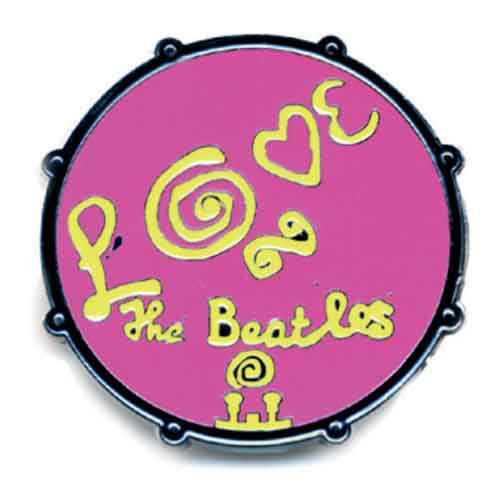 Een foto van een The Beatles Speld Badge