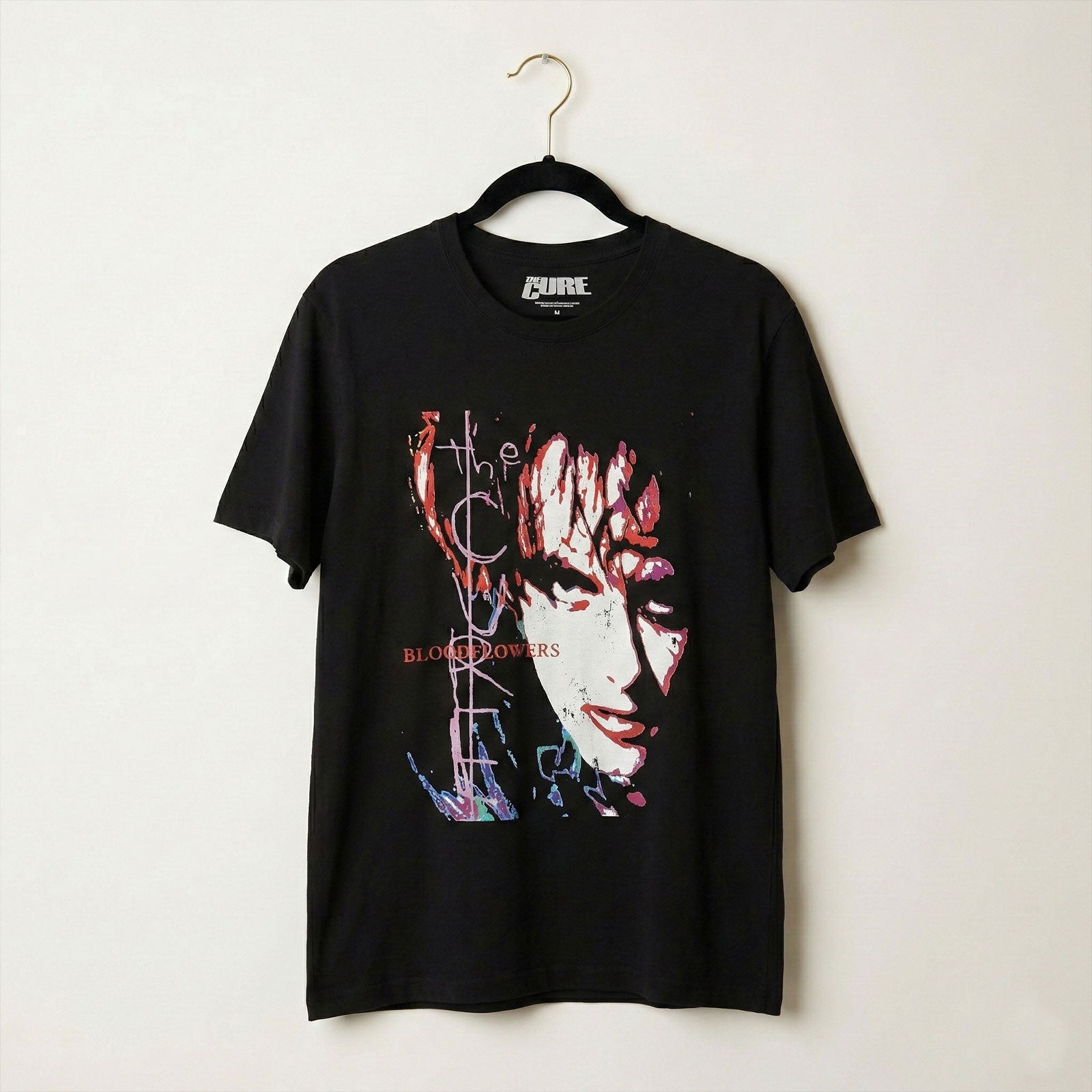 Een foto van een The Cure T-Shirt