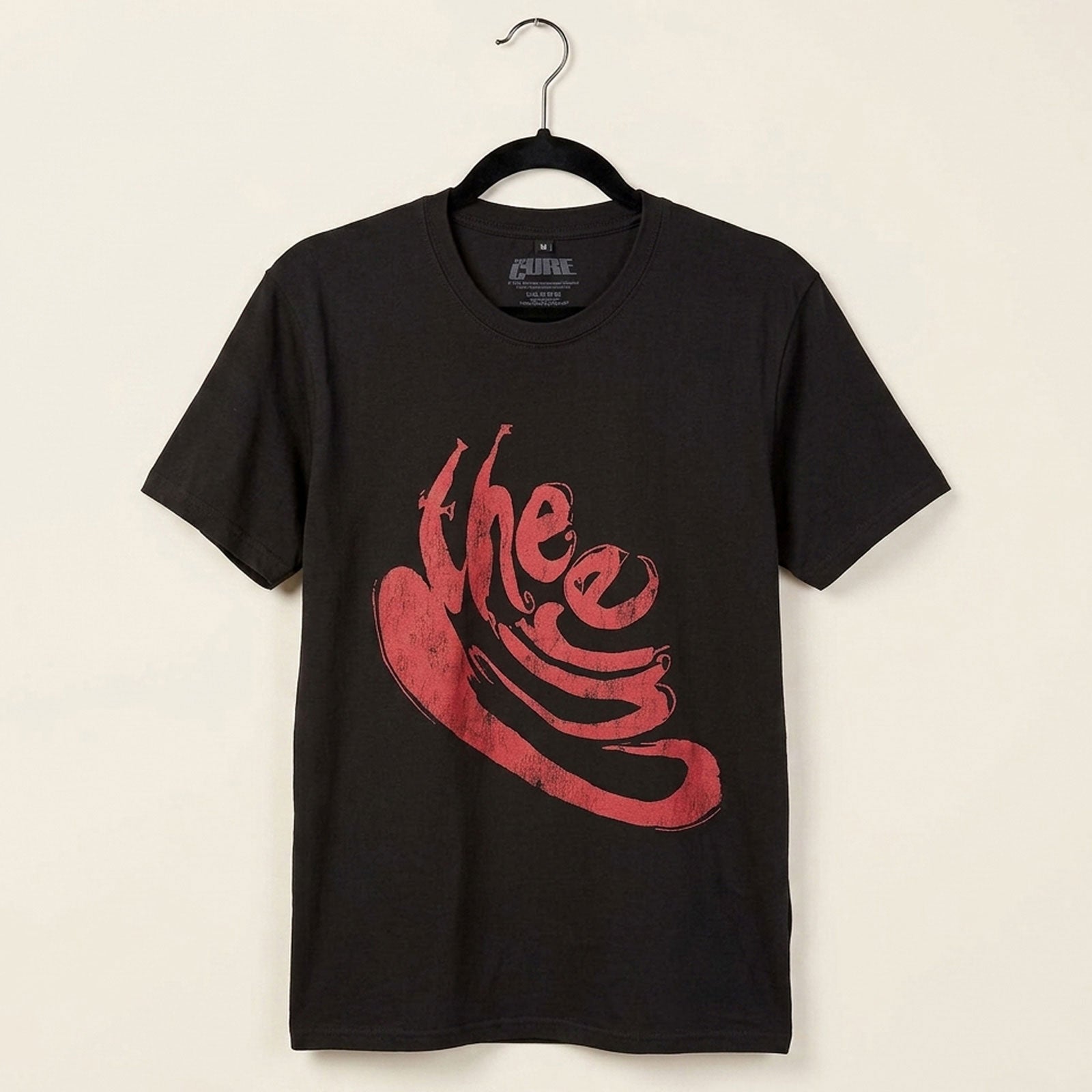 Een foto van een The Cure T-Shirt