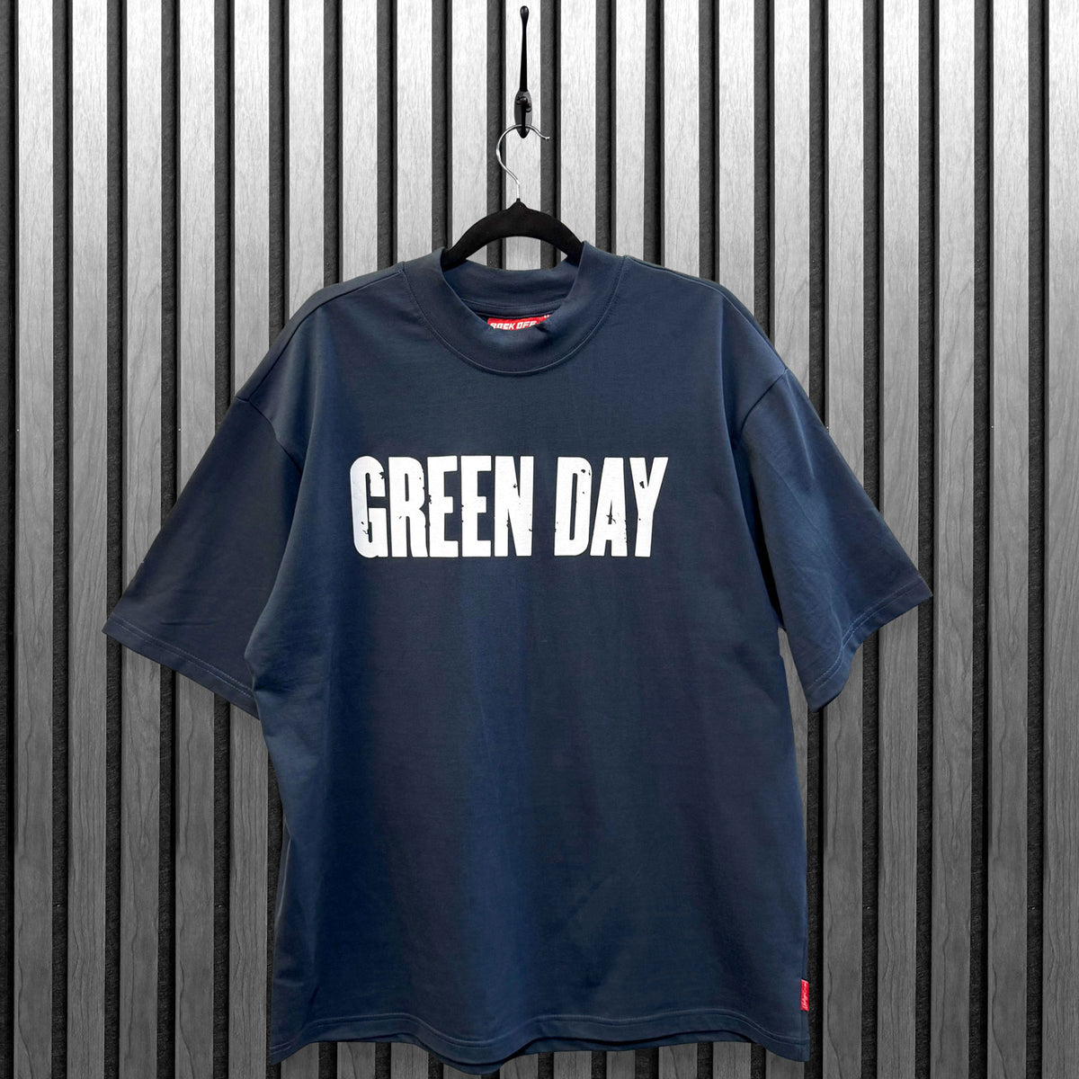 Een foto van een Green Day T-Shirt