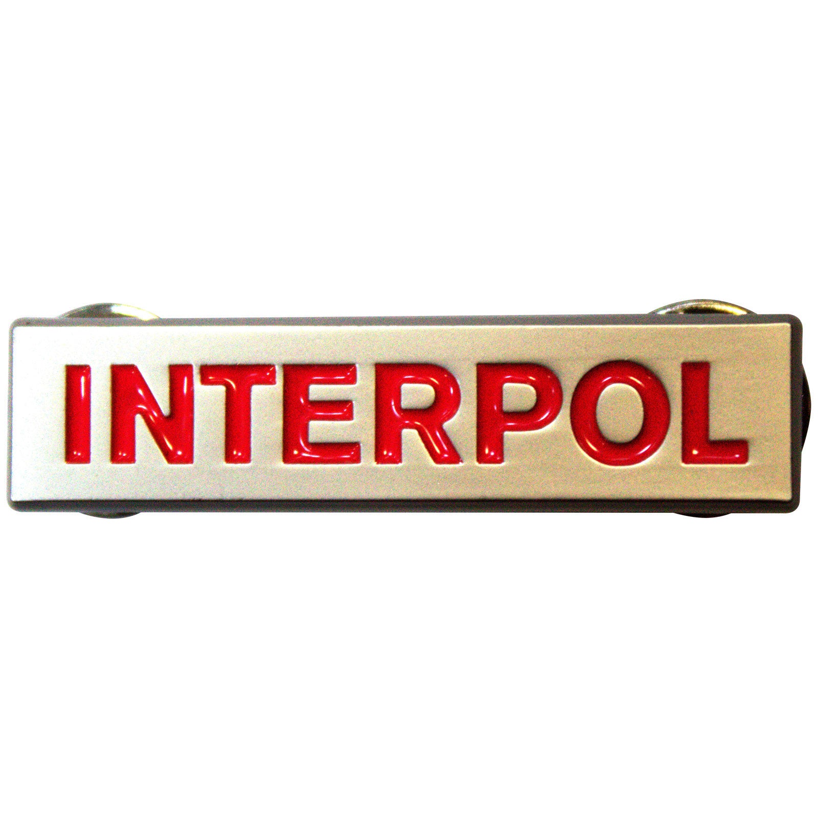 Een foto van een Interpol Speld Badge