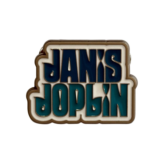 Een foto van een Janis Joplin Speld Badge