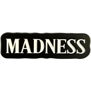 Een foto van een Madness Magneet