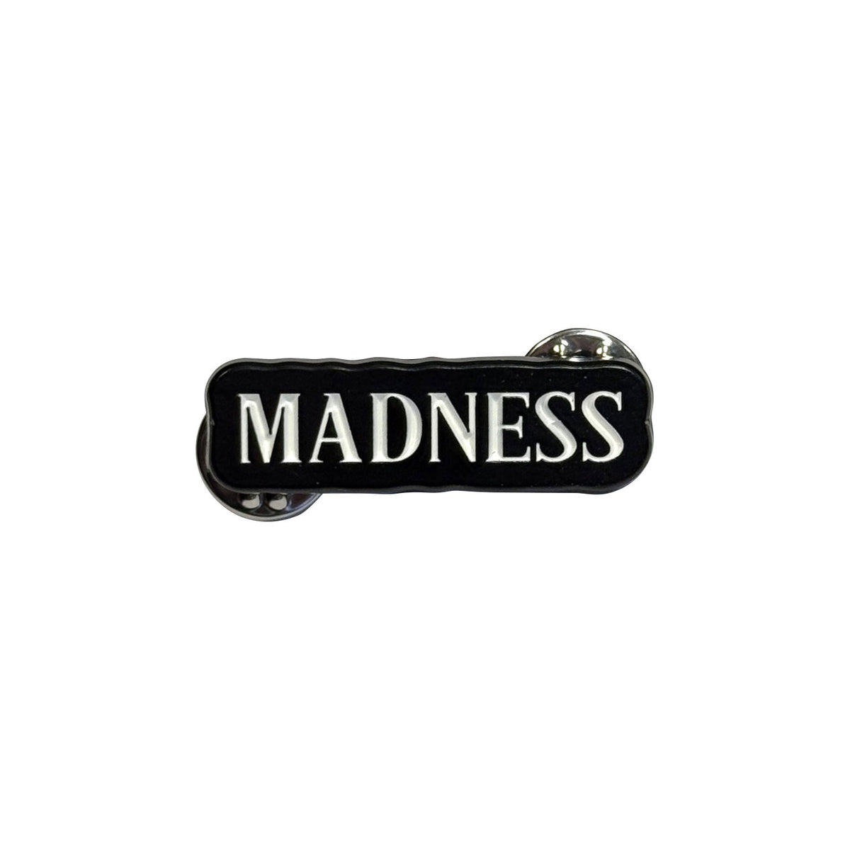Een foto van een Madness Speld Badge