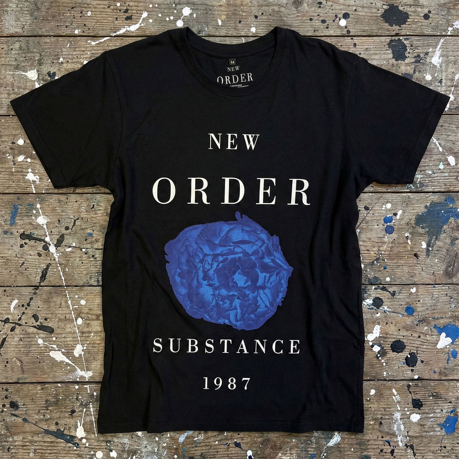 Een foto van een New Order T-Shirt
