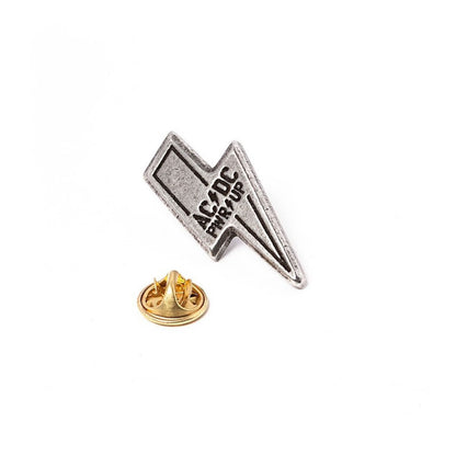 Een foto van een AC/DC Speld Badge