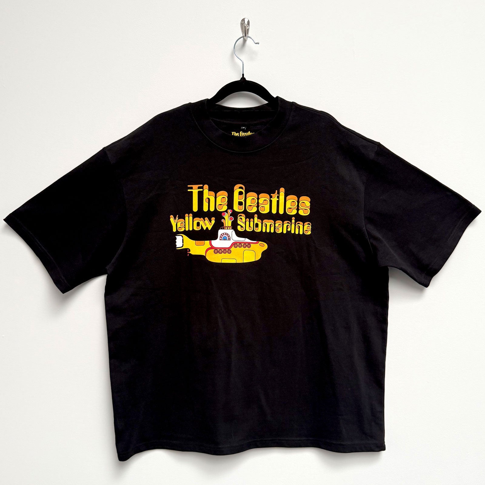 Een foto van een The Beatles T-Shirt