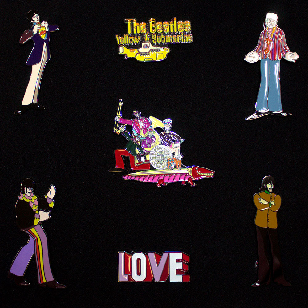Een foto van een The Beatles Speld Badge